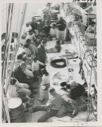 Image of Group of natives on deck from rigging